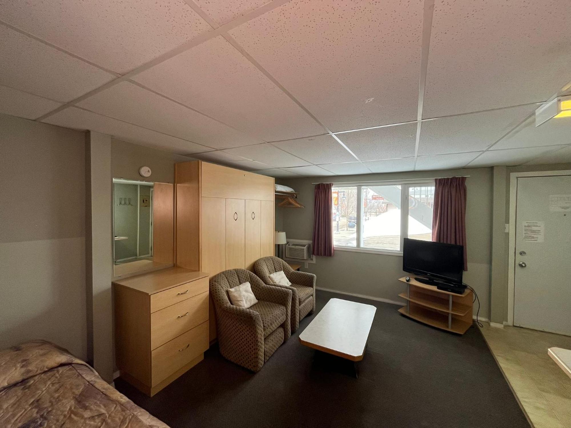 Raccoon Lodge Motel Sylvan Lake Quarto foto