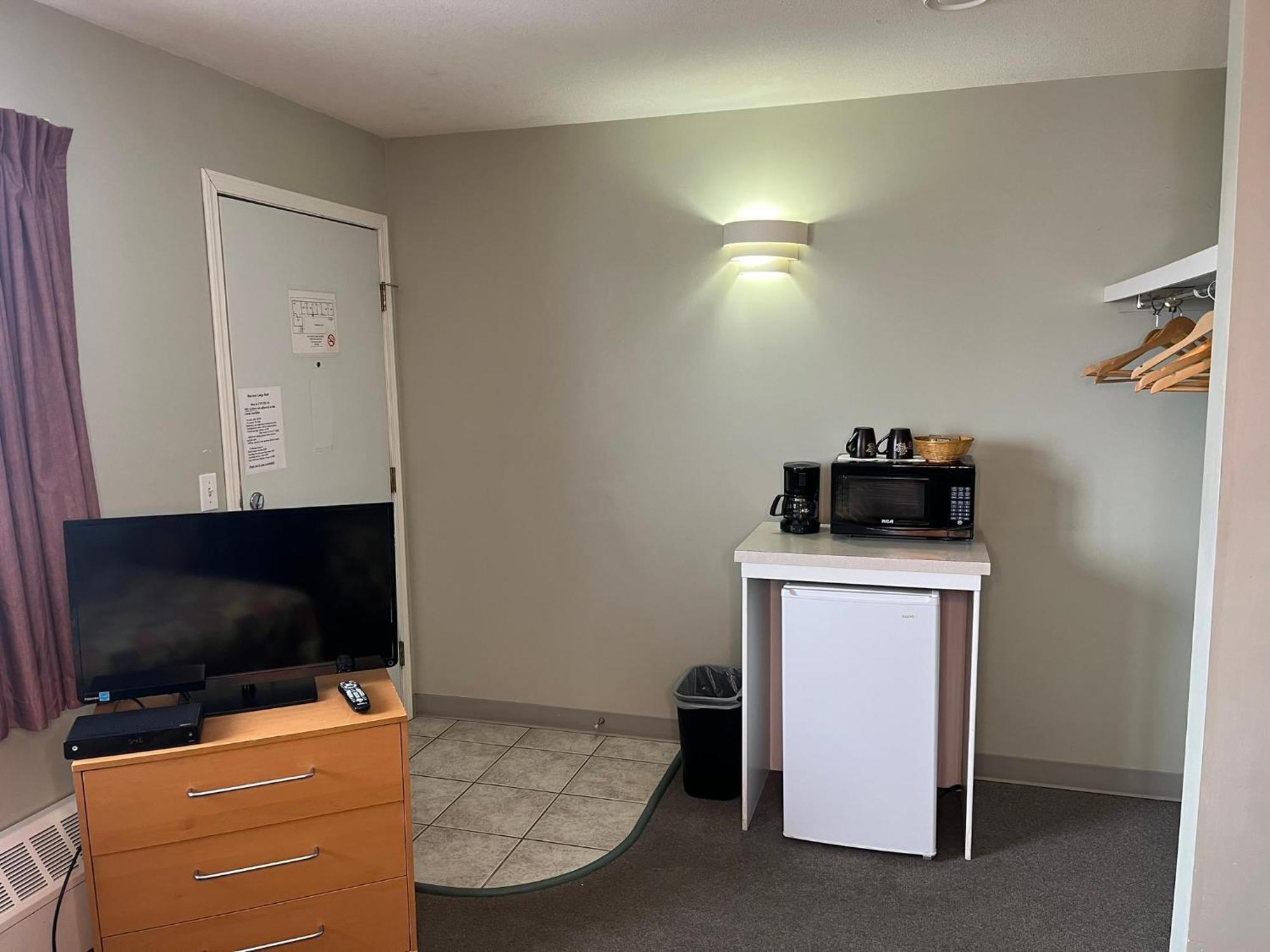 Raccoon Lodge Motel Sylvan Lake Quarto foto