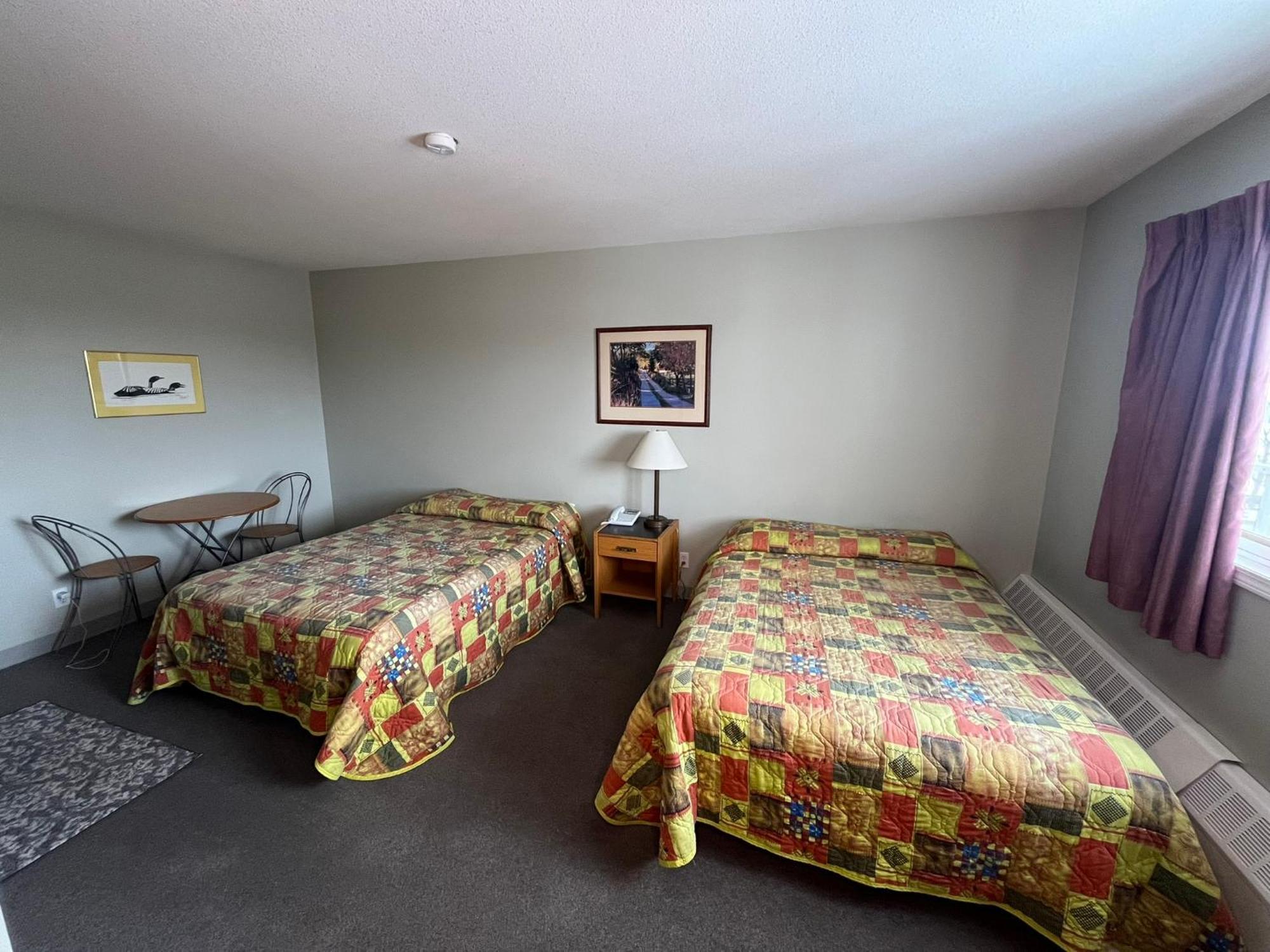 Raccoon Lodge Motel Sylvan Lake Quarto foto